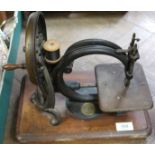 An early Willcox & Gibbs hand sewing machine