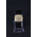 A lady's gold plated Omega De Ville wristwatch on black leather strap with box and papers