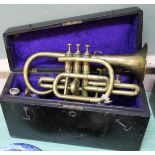 A cased brass Hawkes & Son cornet