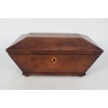 A Victorian mahogany sarcophagus tea caddy