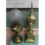 A brass oil lamp plus an urn shaped table lamp