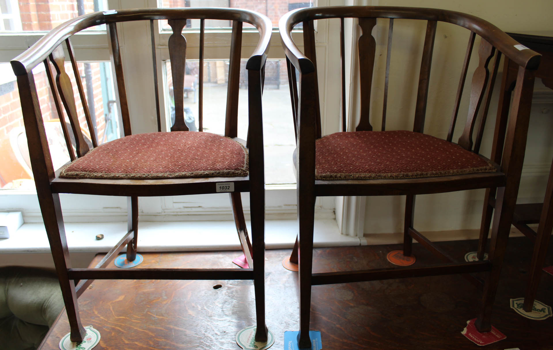 A pair of Edwardian satinwood armchairs