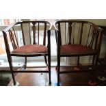 A pair of Edwardian satinwood armchairs