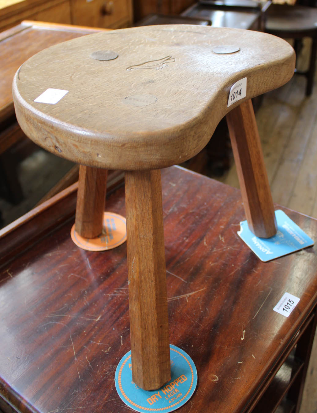 An oak three legged milking stool