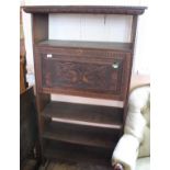 Unusual carved oak freestanding shelves with carved panel door