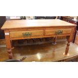 An Edwardian satinwood two drawer coffee table