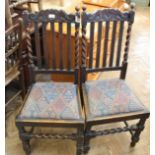 A set of three Edwardian barley twist oak dining chairs