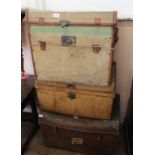 Two metal travelling trunks and a leather and canvas travelling case