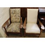 A pair of oak upholstered Edwardian reclining chairs