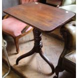 A Victorian mahogany tilt top table with tripod base