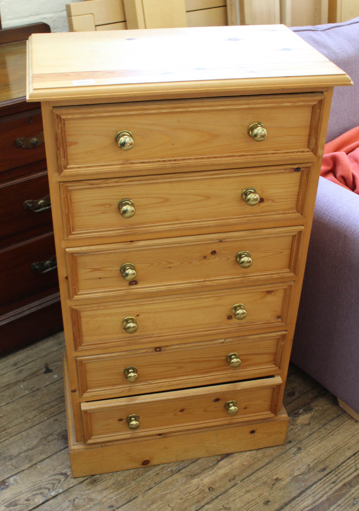 A modern tall bank of six drawers