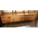 A long 1970's teak sideboard