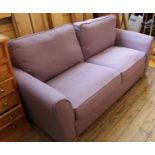 A DFS lilac two seater sofa