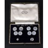 A leather cased set of mother of pearl chain link cufflinks by Johnson, Walker & Tolhurst,