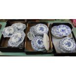 A Staffordshire blue and white windmill decorated part dinner set plus seven Mintons Delft plates