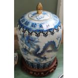 A modern Chinese blue and white dragon decorated lidded jar