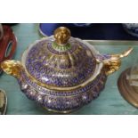 A continental blue and gilt porcelain tureen and ladle