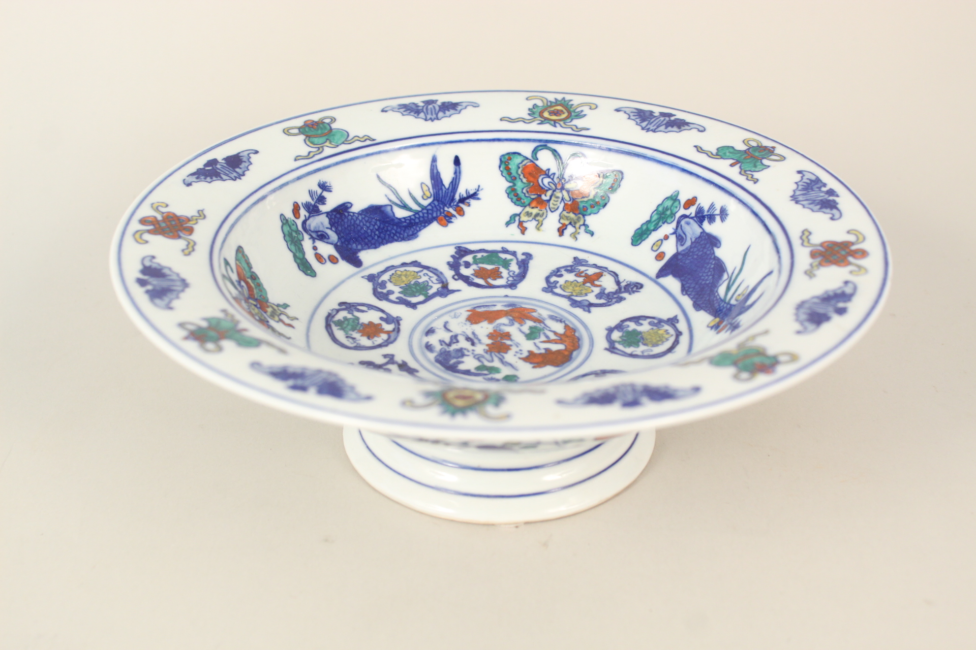 A modern Chinese carp and floral bowl