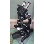 A Watson Bactil binocular microscope