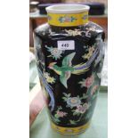 A modern Chinese black ground bird and floral vase,