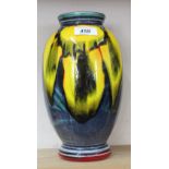 A Poole blue ground fruit decorated vase,