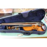 A cased German violin c1900 plus two bows