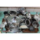 A silver plated three piece tea set plus other silver plate