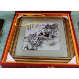 A cased Chinese porcelain plaque of two dogs,