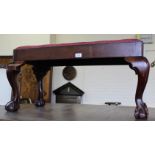 A late Victorian mahogany stool on ball and claw feet