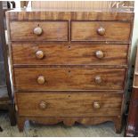 A Regency mahogany five drawer chest on splayed feet with turned mahogany knobs