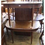 A 19th Century dining table on original cup castors,