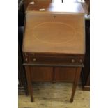 An Edwardian inlaid mahogany small desk