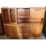 A G-Plan sideboard with part glazed and shelves top