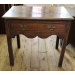 A Georgian oak one drawer table