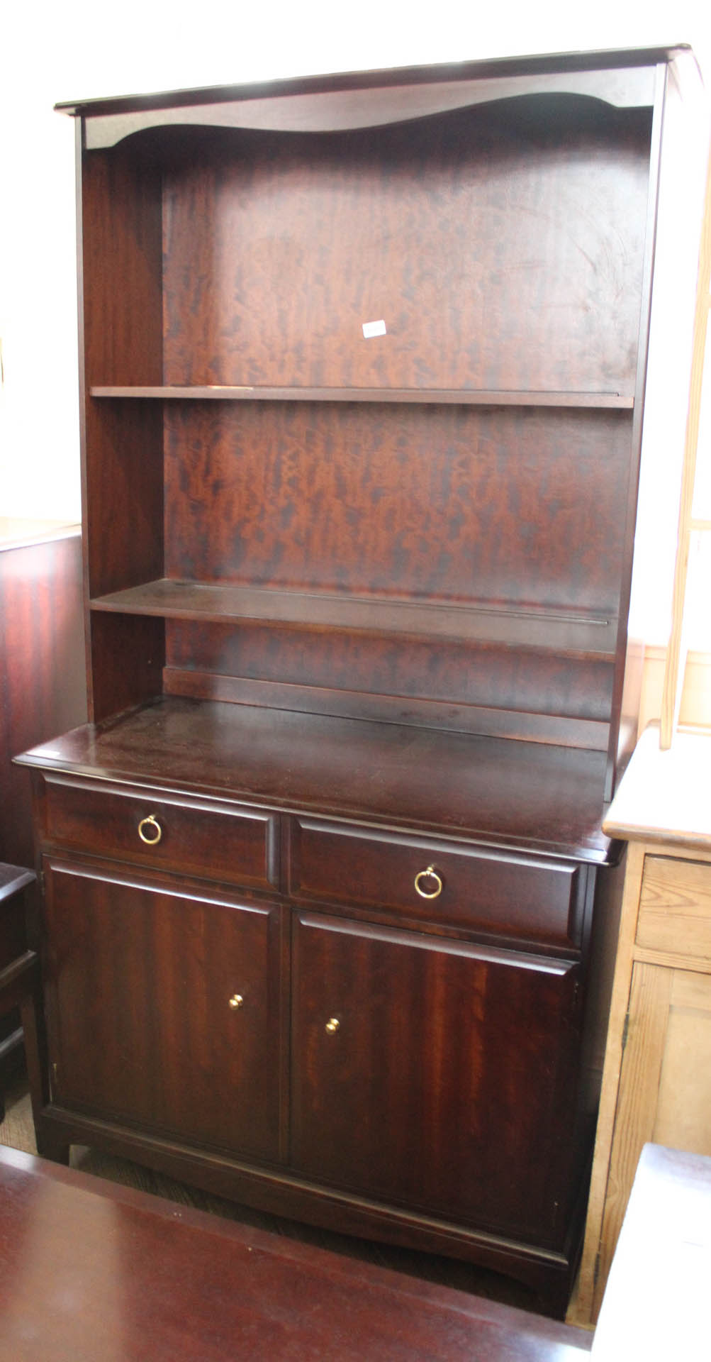 A Stag shelved dresser with two doors and two drawers