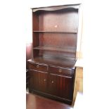 A Stag shelved dresser with two doors and two drawers