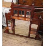 An Edwardian mahogany over mantel mirror