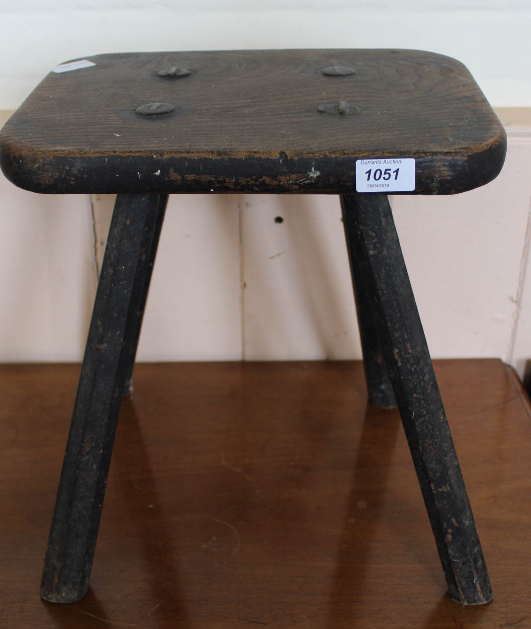 An 18th Century oak four legged stool