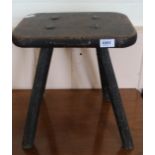 An 18th Century oak four legged stool