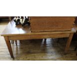 A late Victorian pine farm house table with formica top