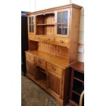 A modern stained pine kitchen dresser