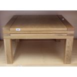 A modern oak extending coffee table