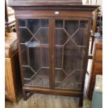 An Edwardian mahogany astragal glazed adjustable bookcase