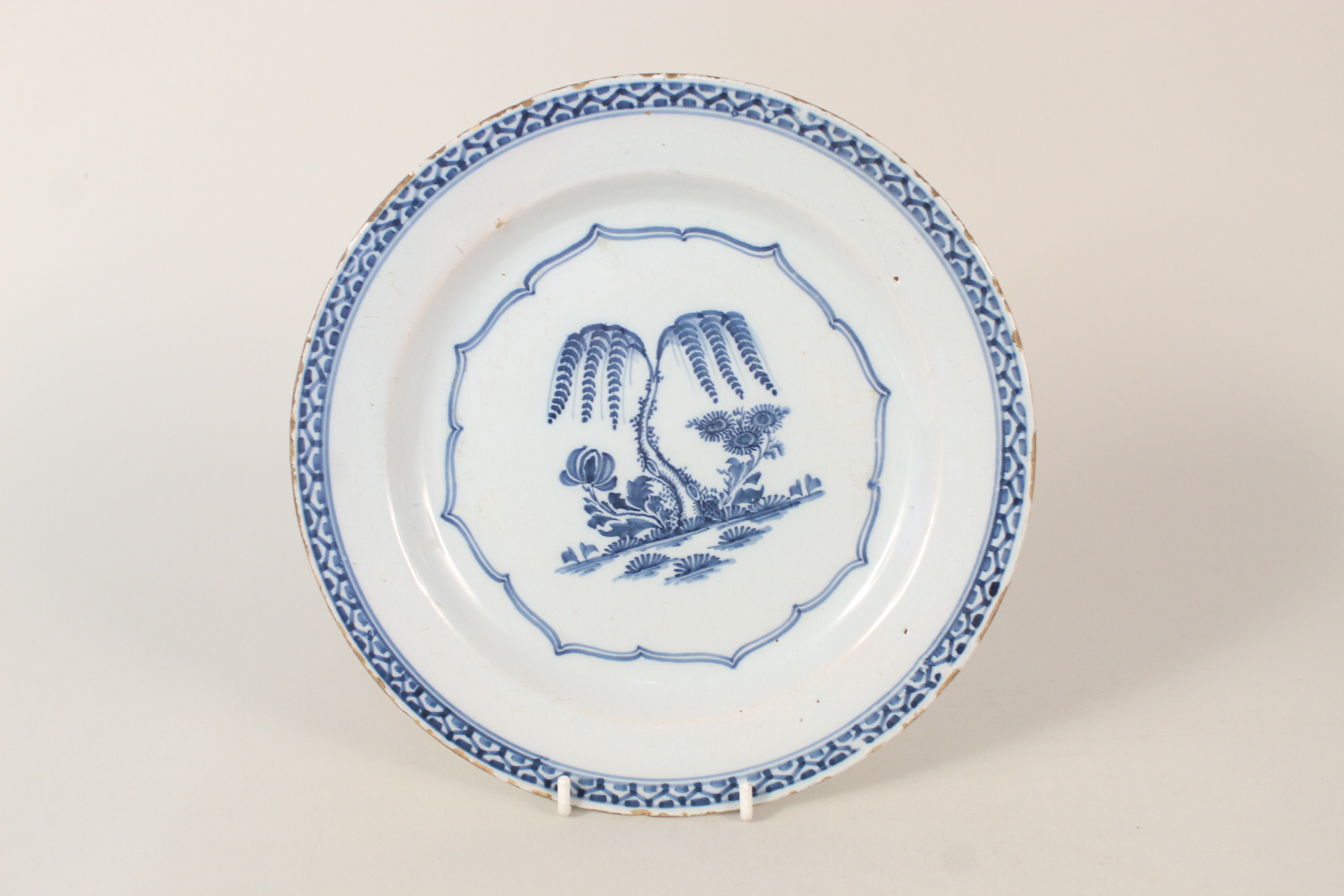 An 18th Century English Delft tree decorated plate