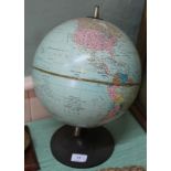 A tin plate terrestrial globe plus various coins