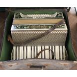 A cased Hohner Verdi I accordion