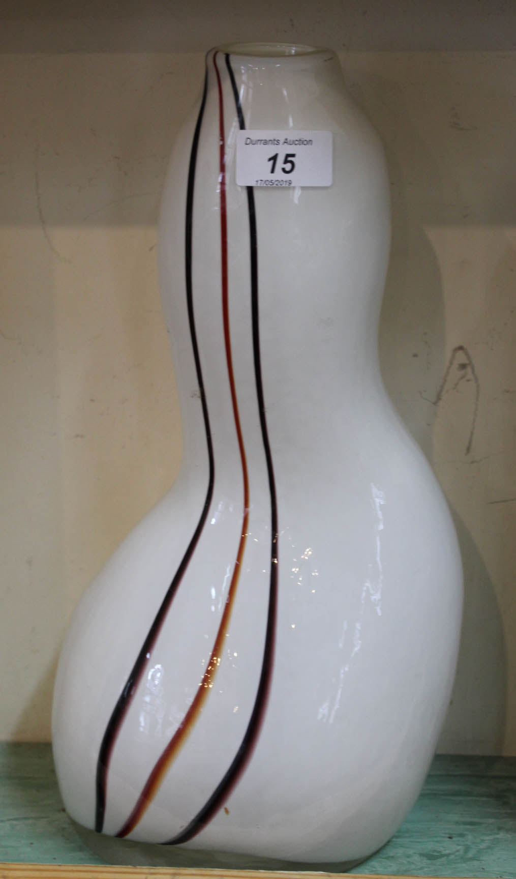 A Murano white and striped glass vase