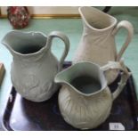 Three Victorian stoneware relief moulded jugs with corn sheaf,