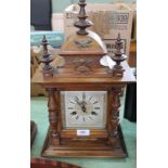 A Junghans striking mantel clock with applied gilt metal decoration