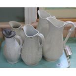 Five Victorian stoneware relief moulded jugs including Copeland and Dudson